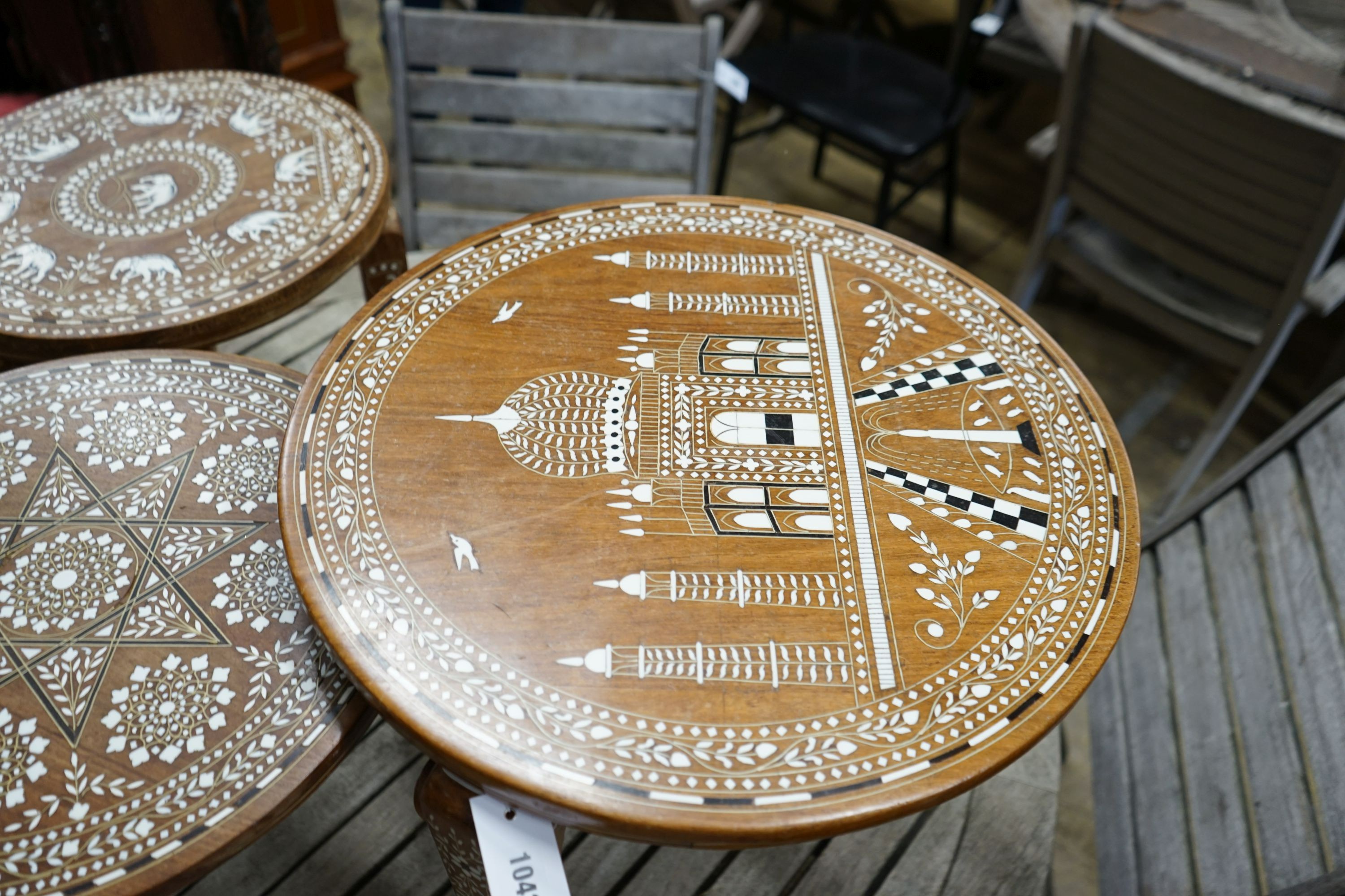 Three Indian circular inlaid hardwood occasional tables, largest diameter 50cm, height 46cm